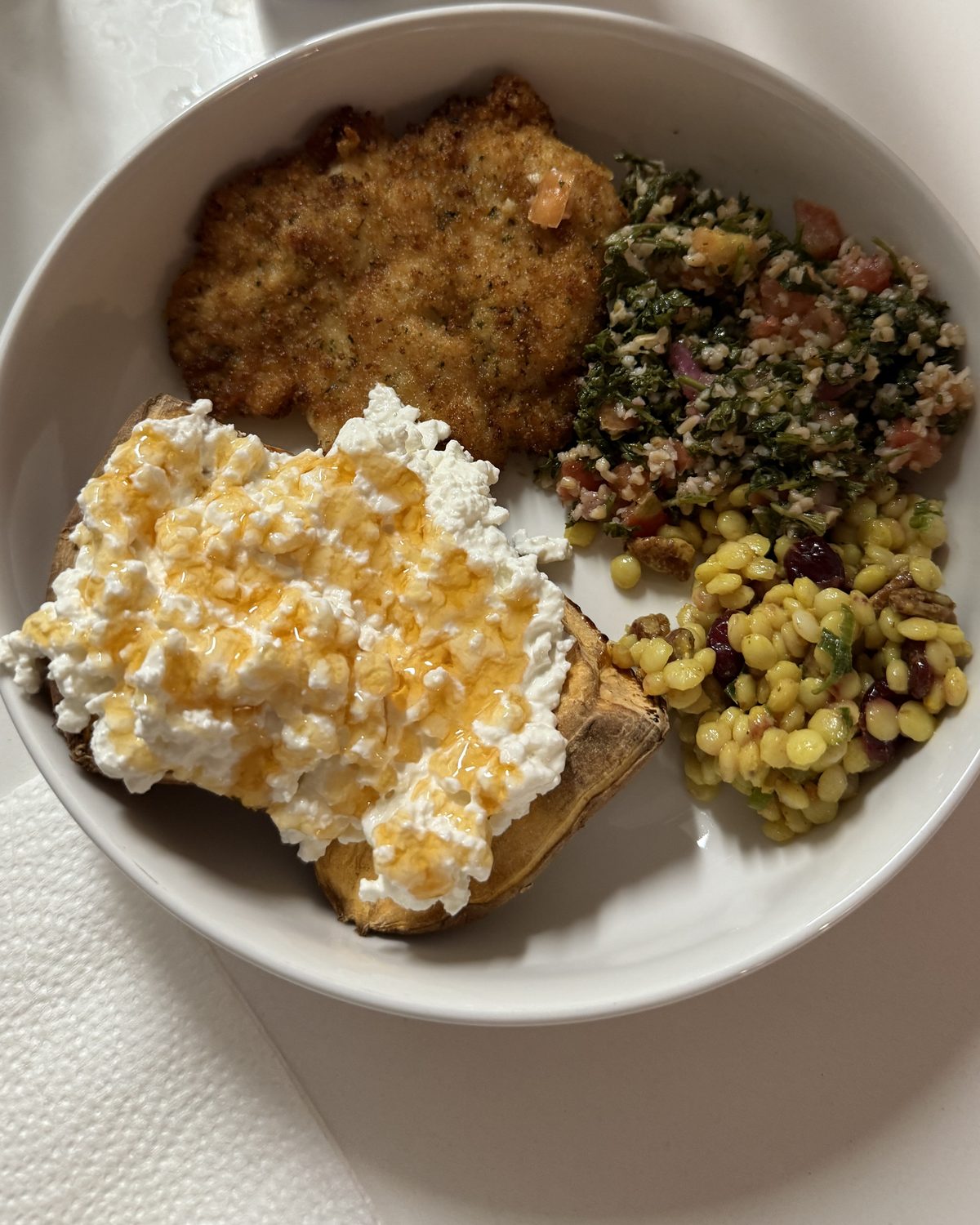 Chicken cutlet with sweet potato, tabbouleh, and pearl couscous salad